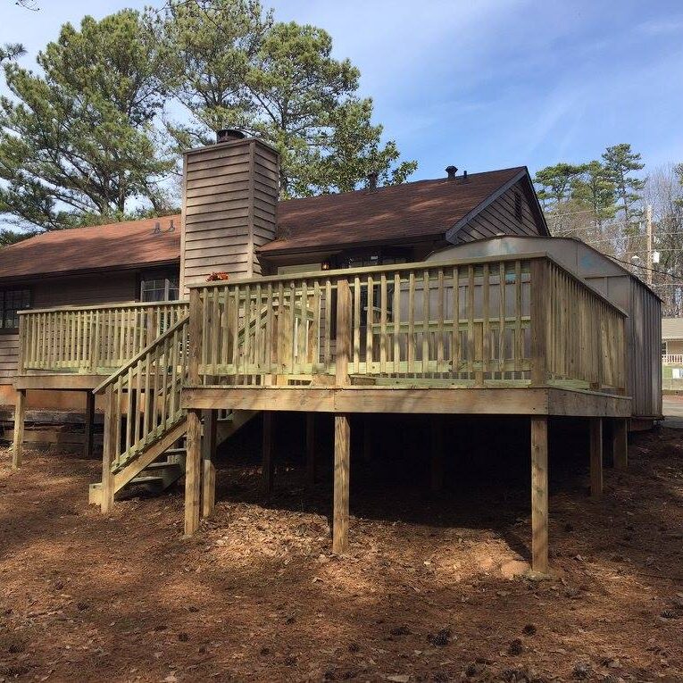 Deck with vertical bars and stairs