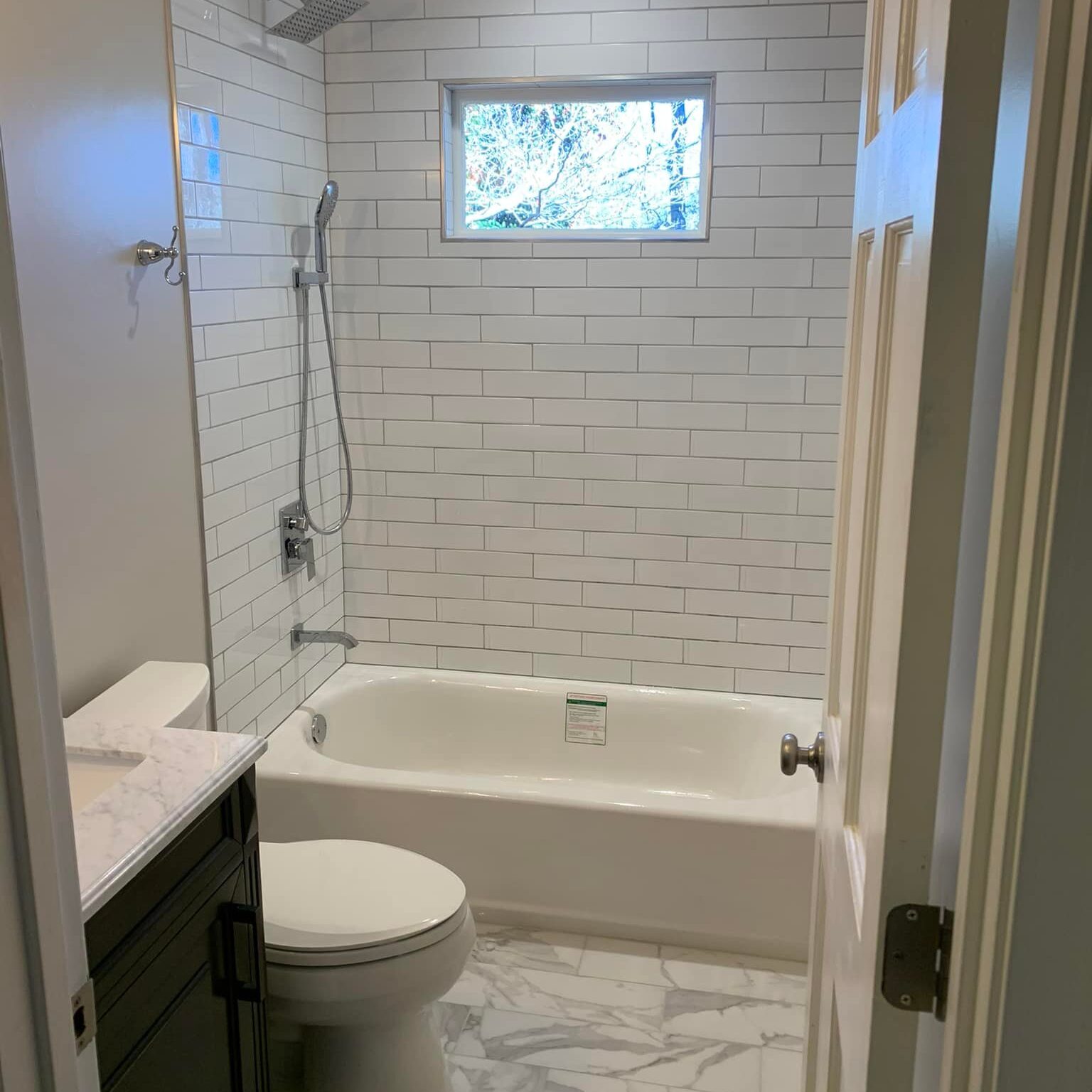 Newly tiled shower and bathroom