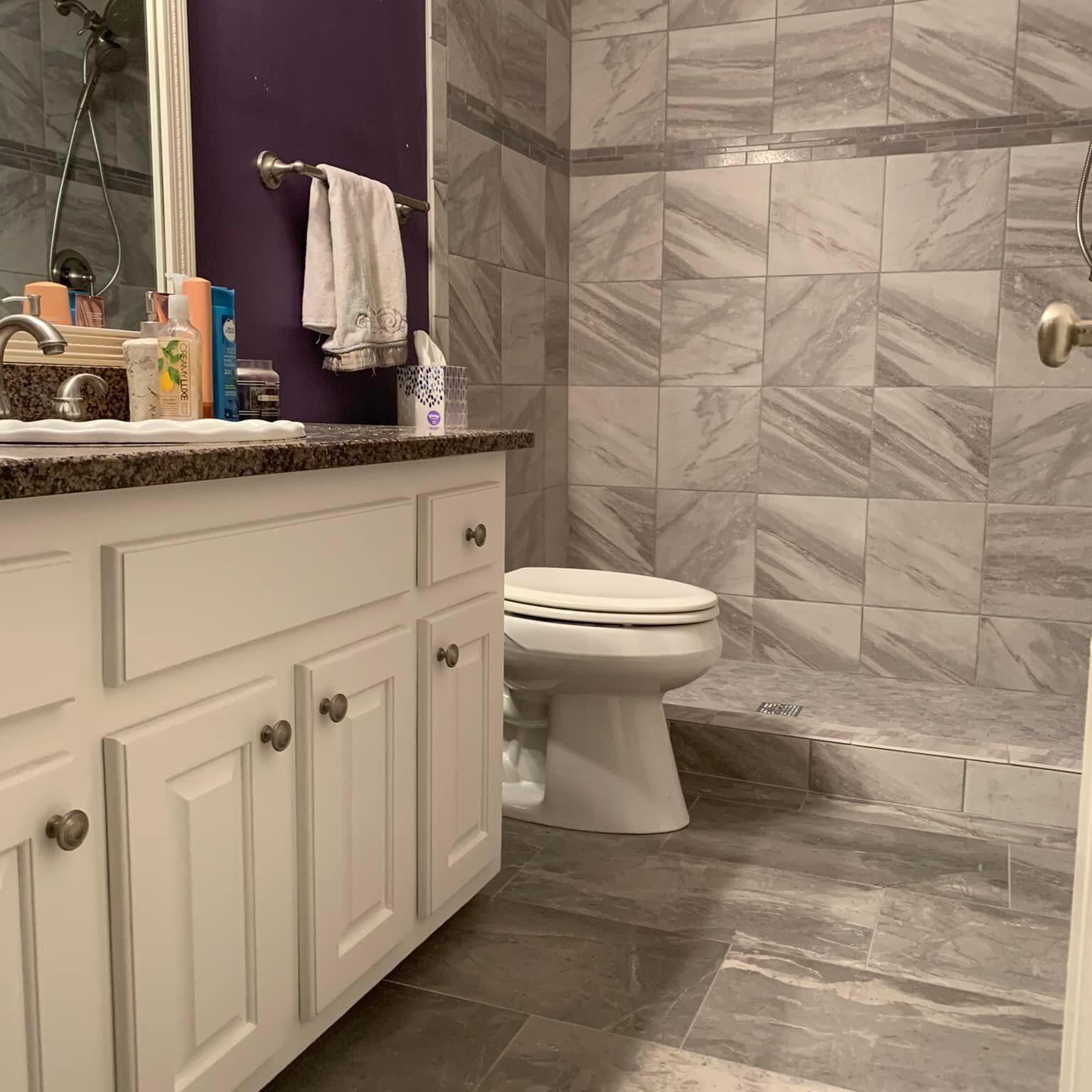 Gray swirl tiles in bathroom